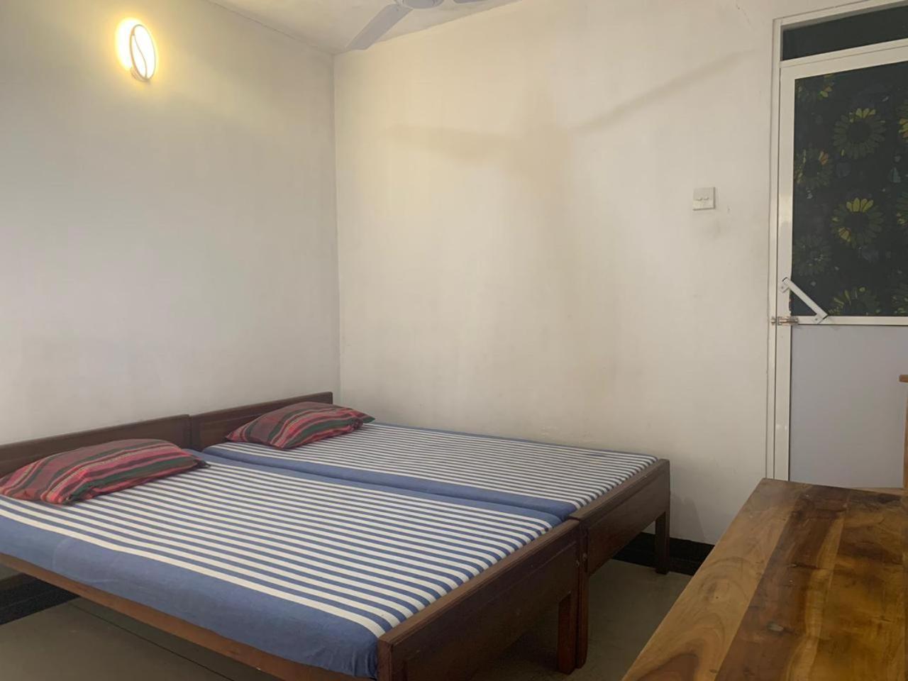 Lodge In 611 Kandy Ruang foto